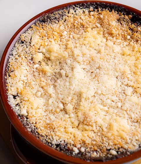 parmigiana di melanzane con ricotta, miele millefiori, mozzarella bio e noci (specialità di Aldo, dal ‘94)